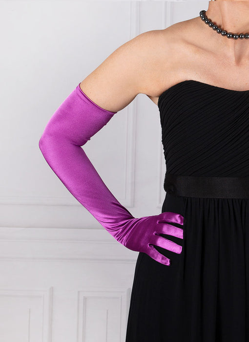 Woman wearing violet purple opera satin gloves with an evening dress
