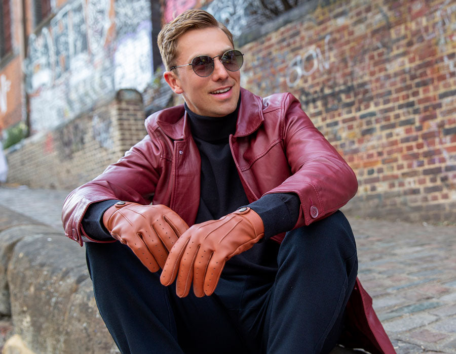 A man wearing heritage leather driving gloves in London