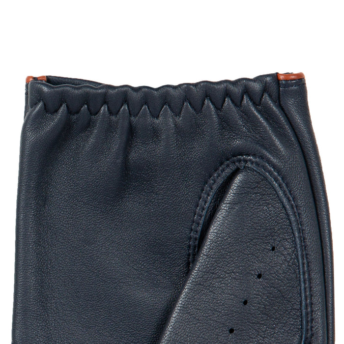 Men's leather driving gloves in Navy blue with Tan brown trim  left cuff