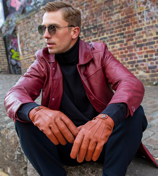 Man wearing heritage leather gloves