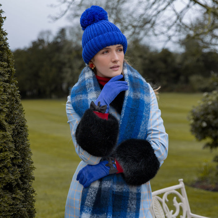 Woman wearing Cobalt Plaid Check scarf with tassels in park