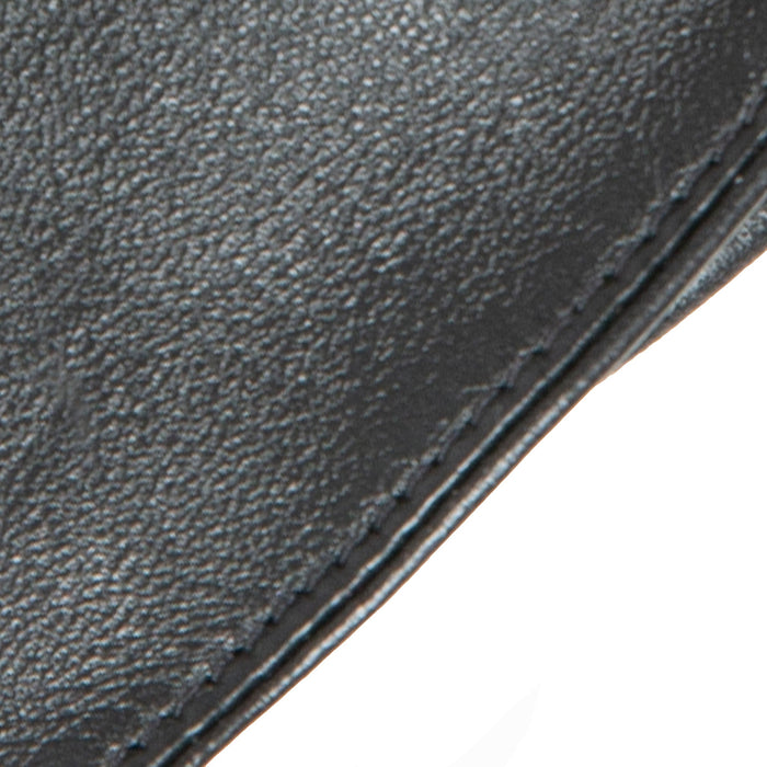 Women's Fingerless Leather Driving Gloves in Black closeup