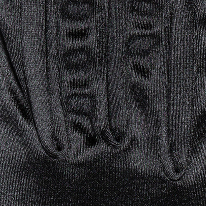 Women's long above-elbow satin gloves in black - close up of the stitching between fingers