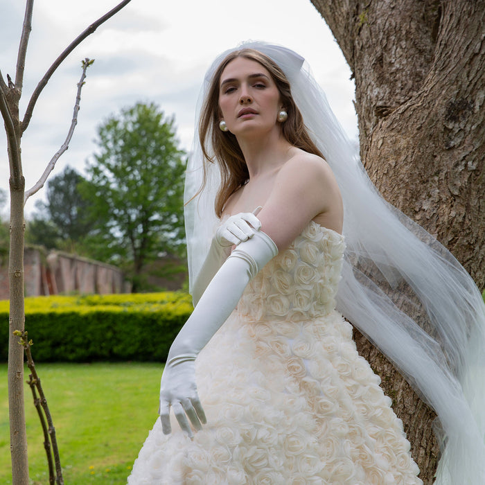 Woman wearing Women's Long Satin Gloves in White with wedding dress