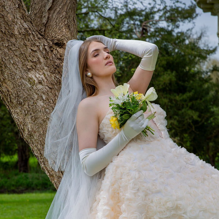 Woman wearing Women's Long Satin Gloves in White with wedding dress