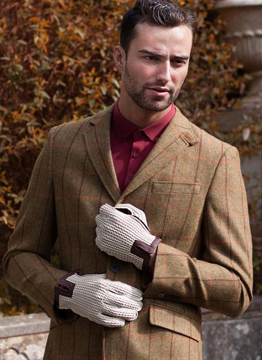 Man wearing crochet back leather driving gloves in brown 