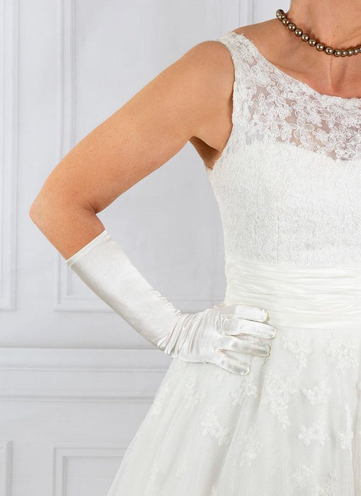 Woman wearing Women's Long Below-Elbow Satin Gloves in Cream