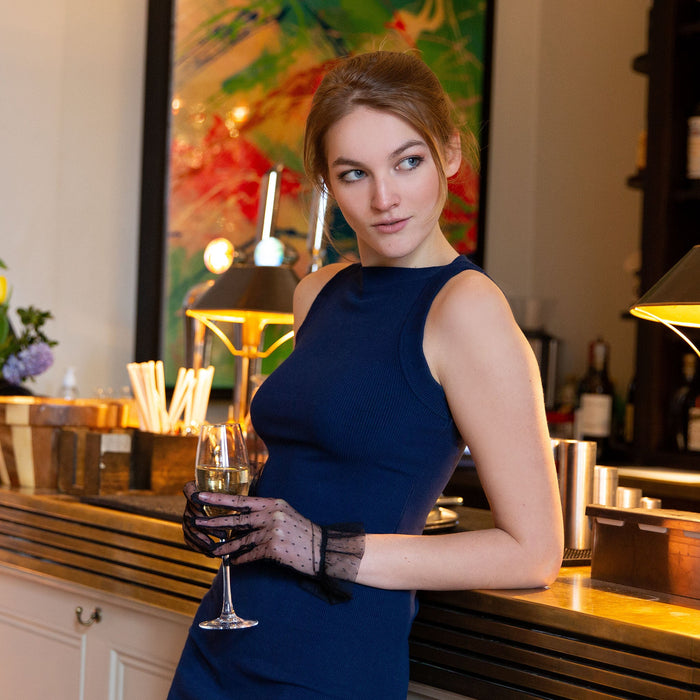 Woman wearing Women’s Tulle Gloves with Frilled Cuff in Black at the bar